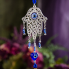 Hanging Evil Eye Hamsa with Tassel at DreamingGoddess.com
