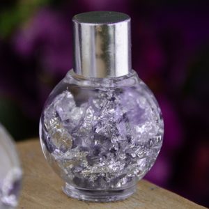 Jar of Silver Flakes in Mineral Oil at DreamingGoddess.com