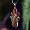 Ammolite with Garnet Pendant at DreamingGoddess.com